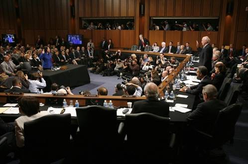 U.S. Supreme Court nominee Judge Sonia Sotomayor (L, in blue) is sworn-in by Senate Judiciary Committee Chairman Patrick Leahy (D-VT) (R) during the U.S. Senate Judiciary Committee confirmation hearings on Capitol Hill in Washington July 13, 2009.