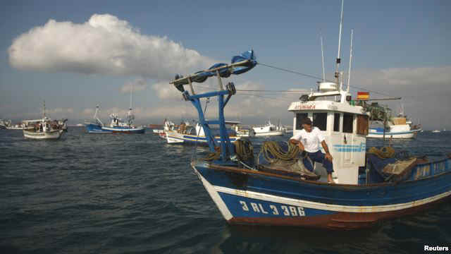 A Spanish fisherman in his boat takes part in a protest at the site of an artificial reef near Gibraltar August 18, 2013.