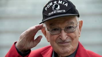 Anthony Acevedo wearing a POW hat 